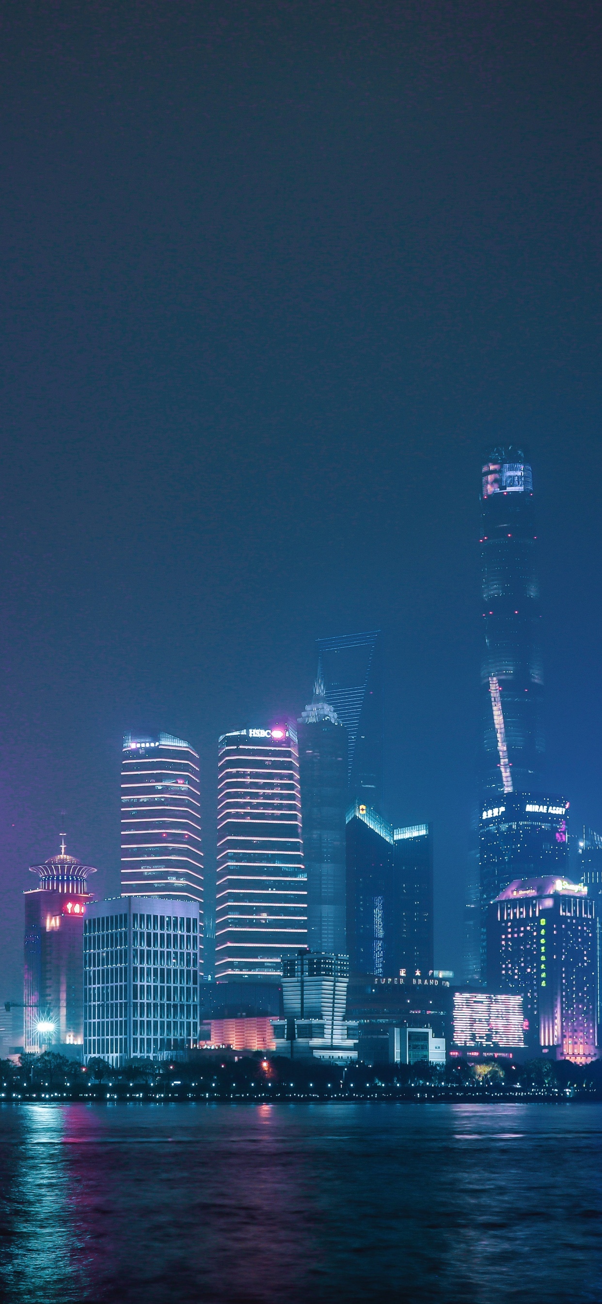 City Skyline During Night Time. Wallpaper in 1242x2688 Resolution