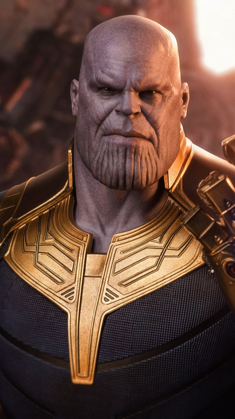 Man in Black and Gold Suit. Wallpaper in 750x1334 Resolution