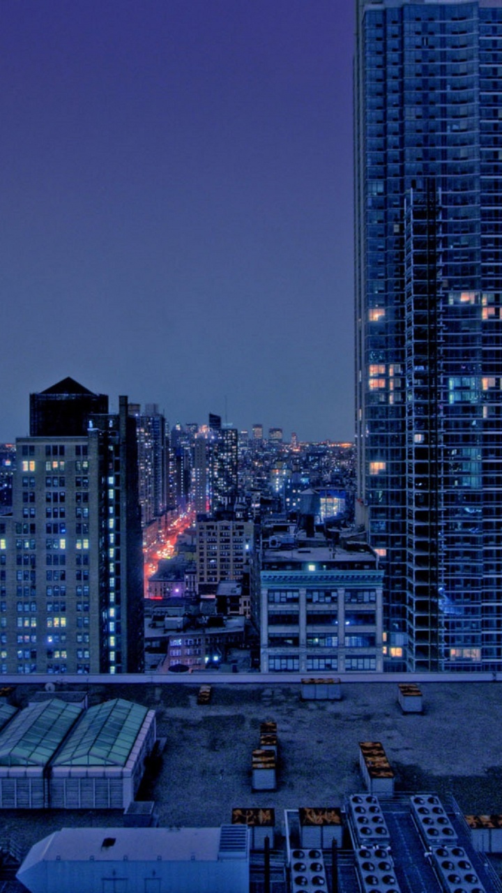 City Skyline During Night Time. Wallpaper in 720x1280 Resolution
