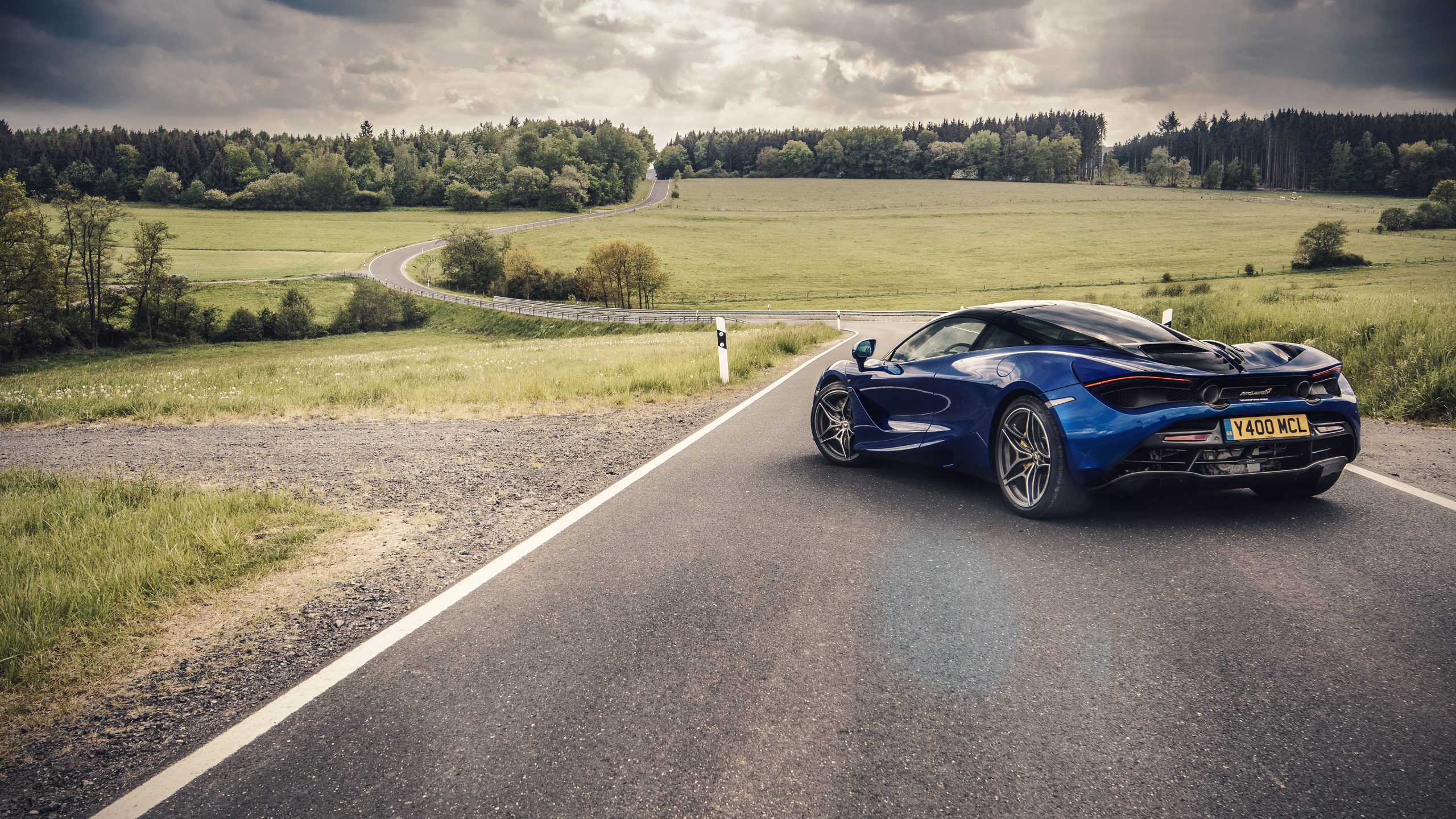 Black Coupe on Road During Daytime. Wallpaper in 2560x1440 Resolution