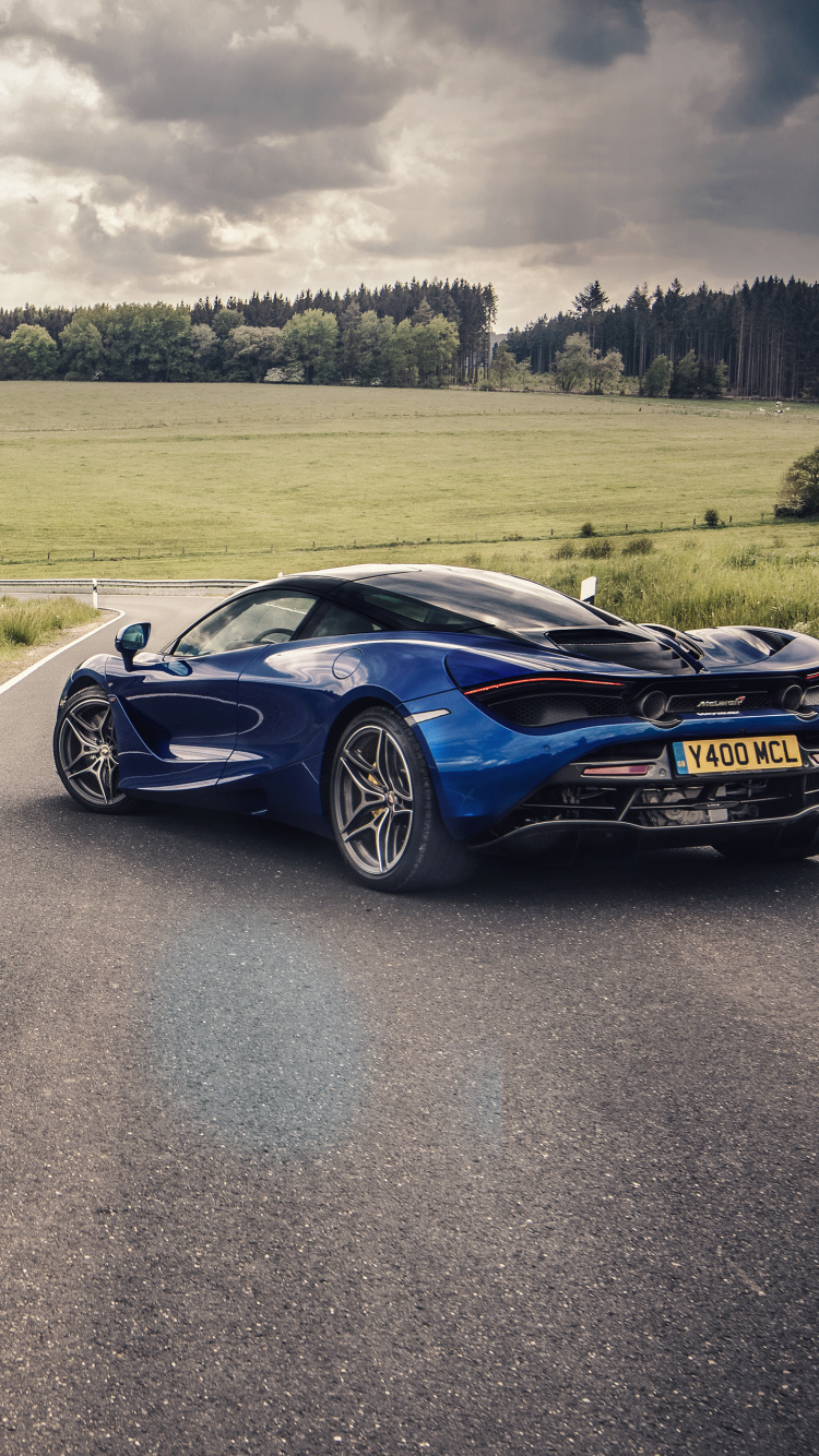 Black Coupe on Road During Daytime. Wallpaper in 750x1334 Resolution