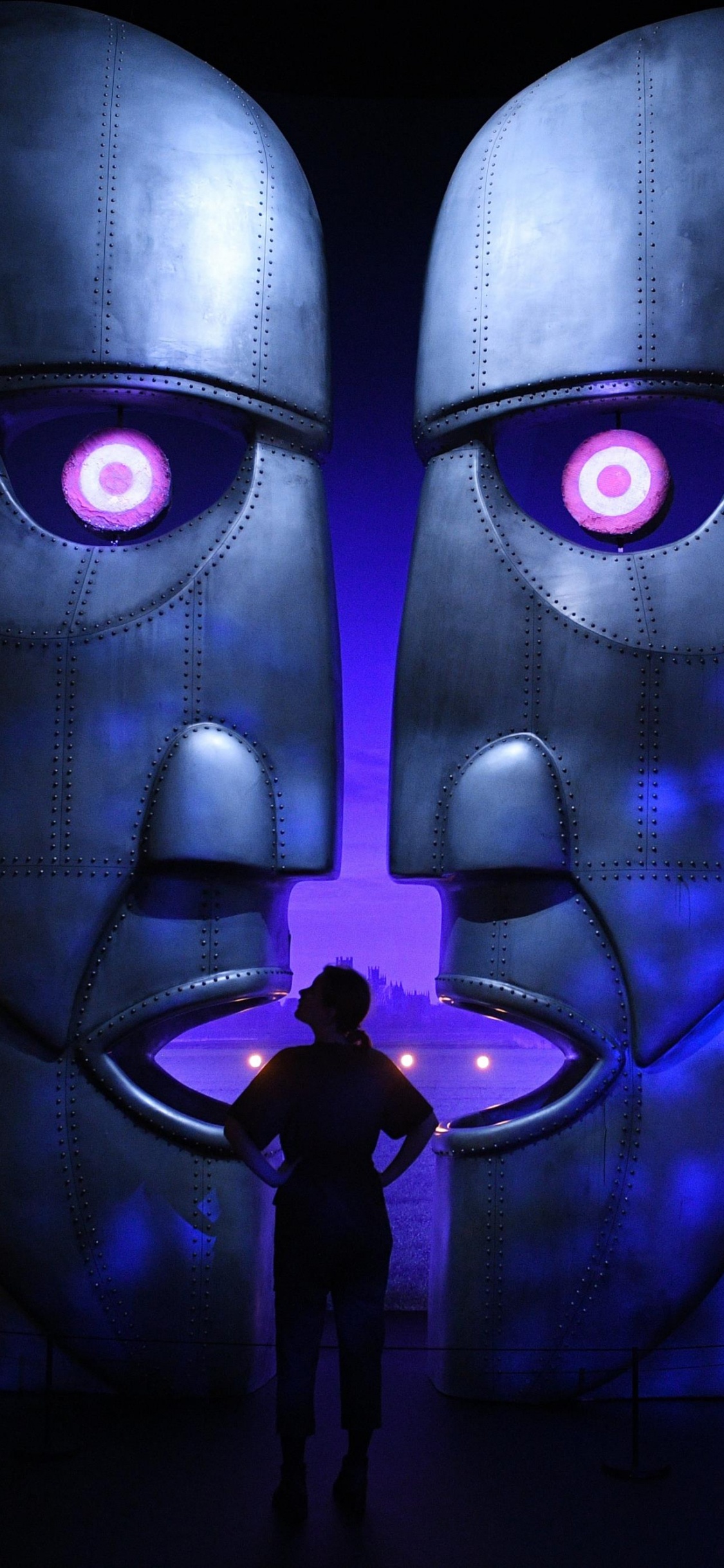 Blaue Und Schwarze Roboterillustration. Wallpaper in 1125x2436 Resolution