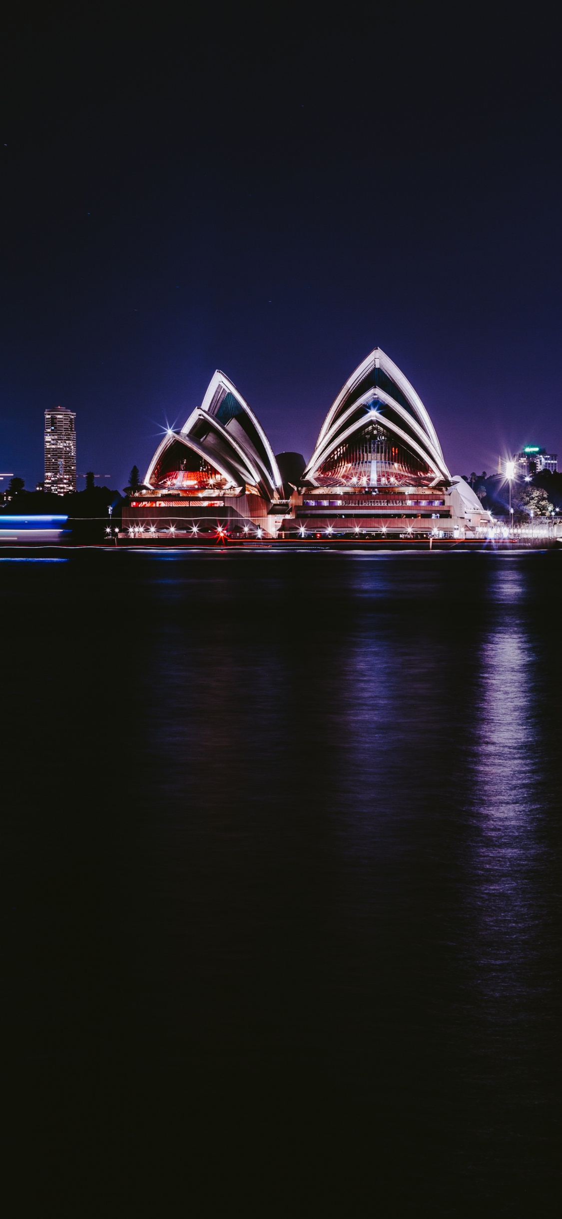 Sydney Opera House Durante la Noche. Wallpaper in 1125x2436 Resolution