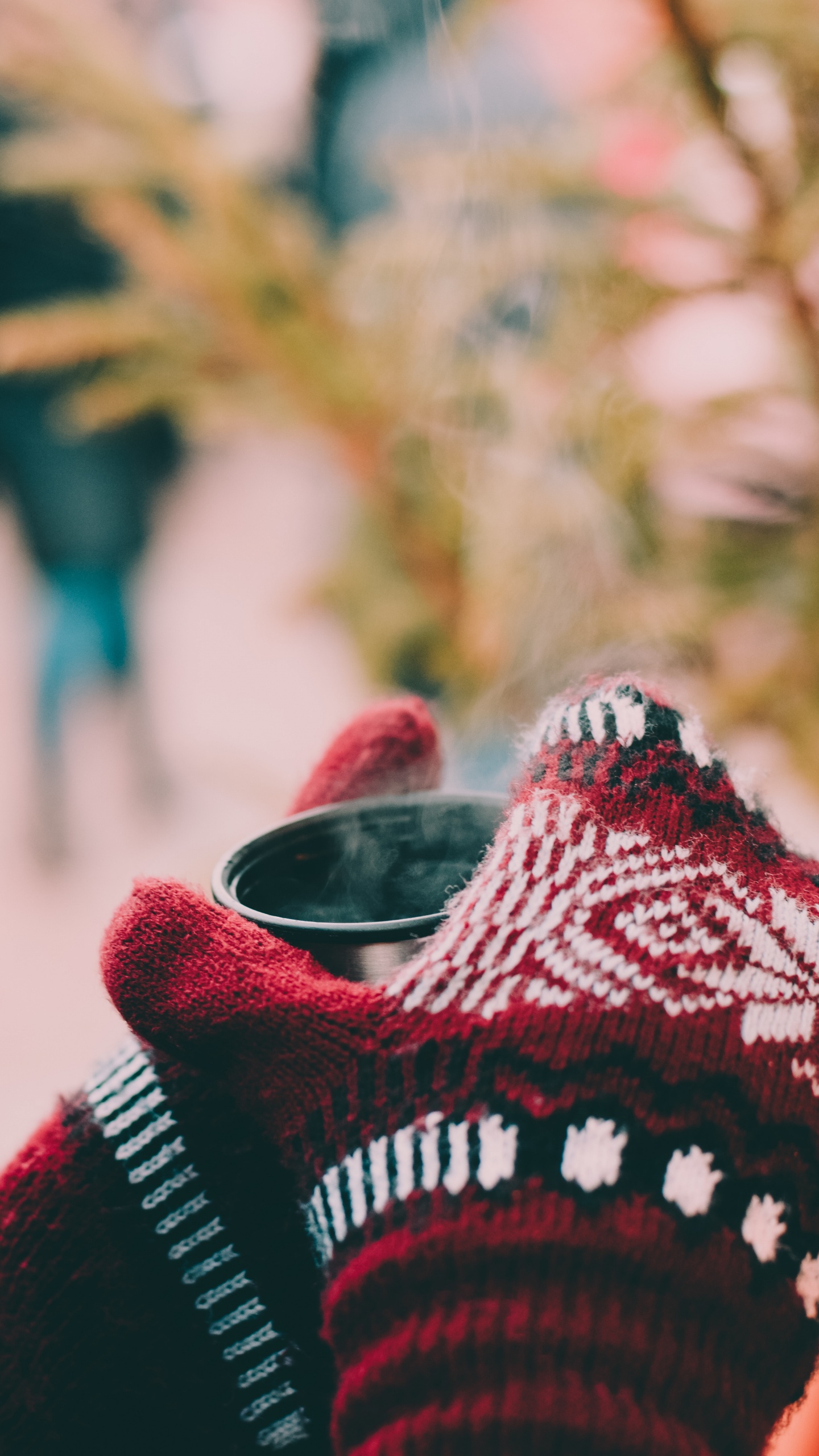 Person in Red White and Black Knit Sweater Holding Black Framed Eyeglasses. Wallpaper in 1440x2560 Resolution