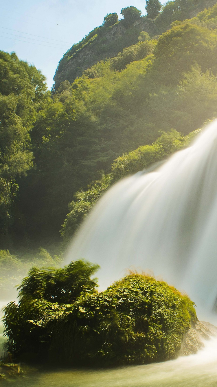 Waterfalls in The Middle of Green Trees. Wallpaper in 750x1334 Resolution