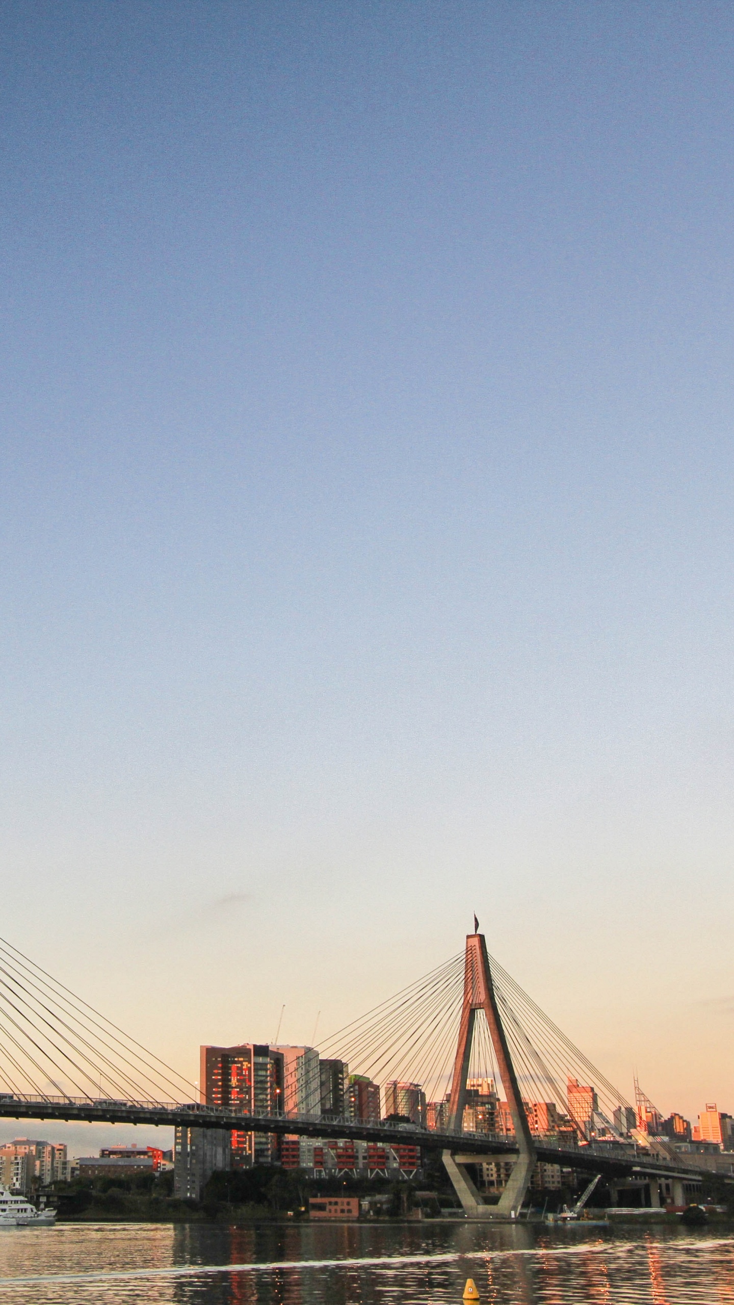 Bridge Over Body of Water During Daytime. Wallpaper in 1440x2560 Resolution