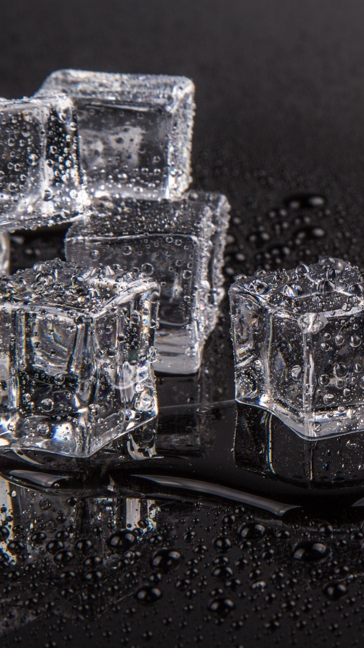 Silver Diamond Studded Ring on Black Surface. Wallpaper in 720x1280 Resolution