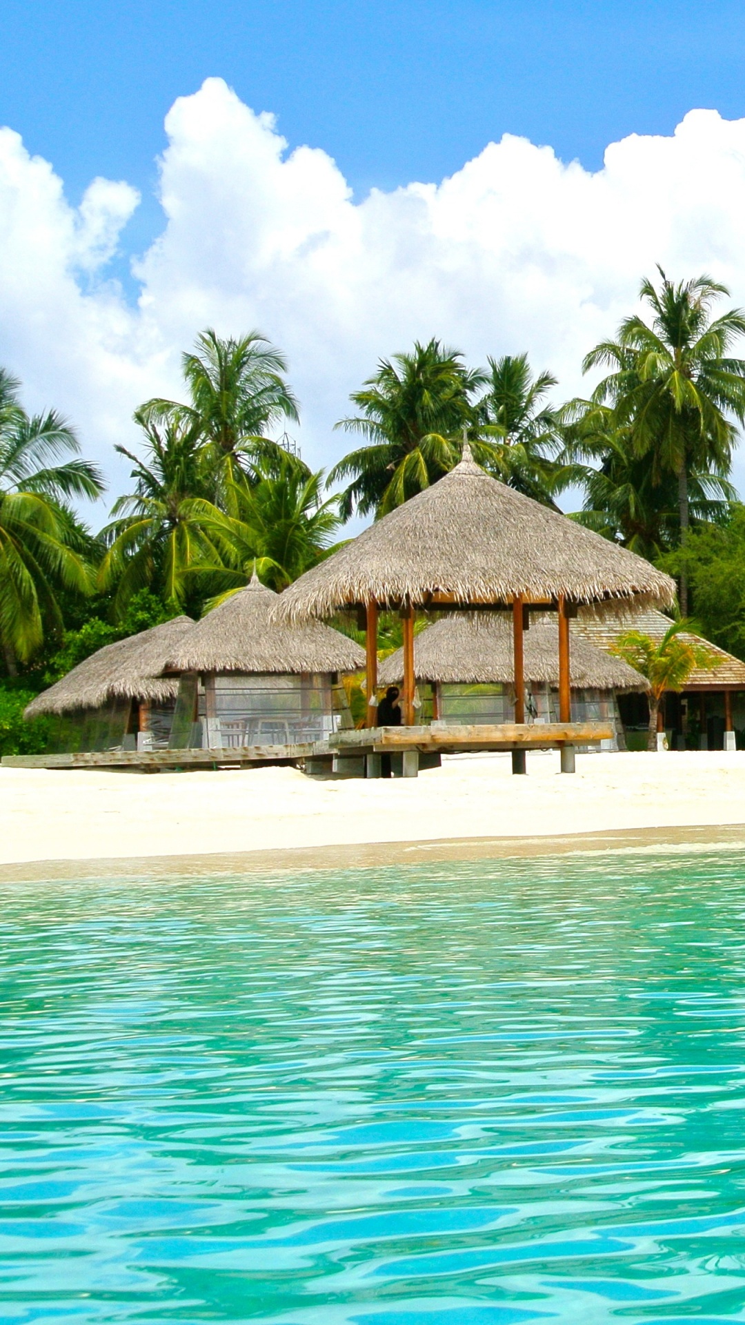 Brown Wooden House on The Beach During Daytime. Wallpaper in 1080x1920 Resolution