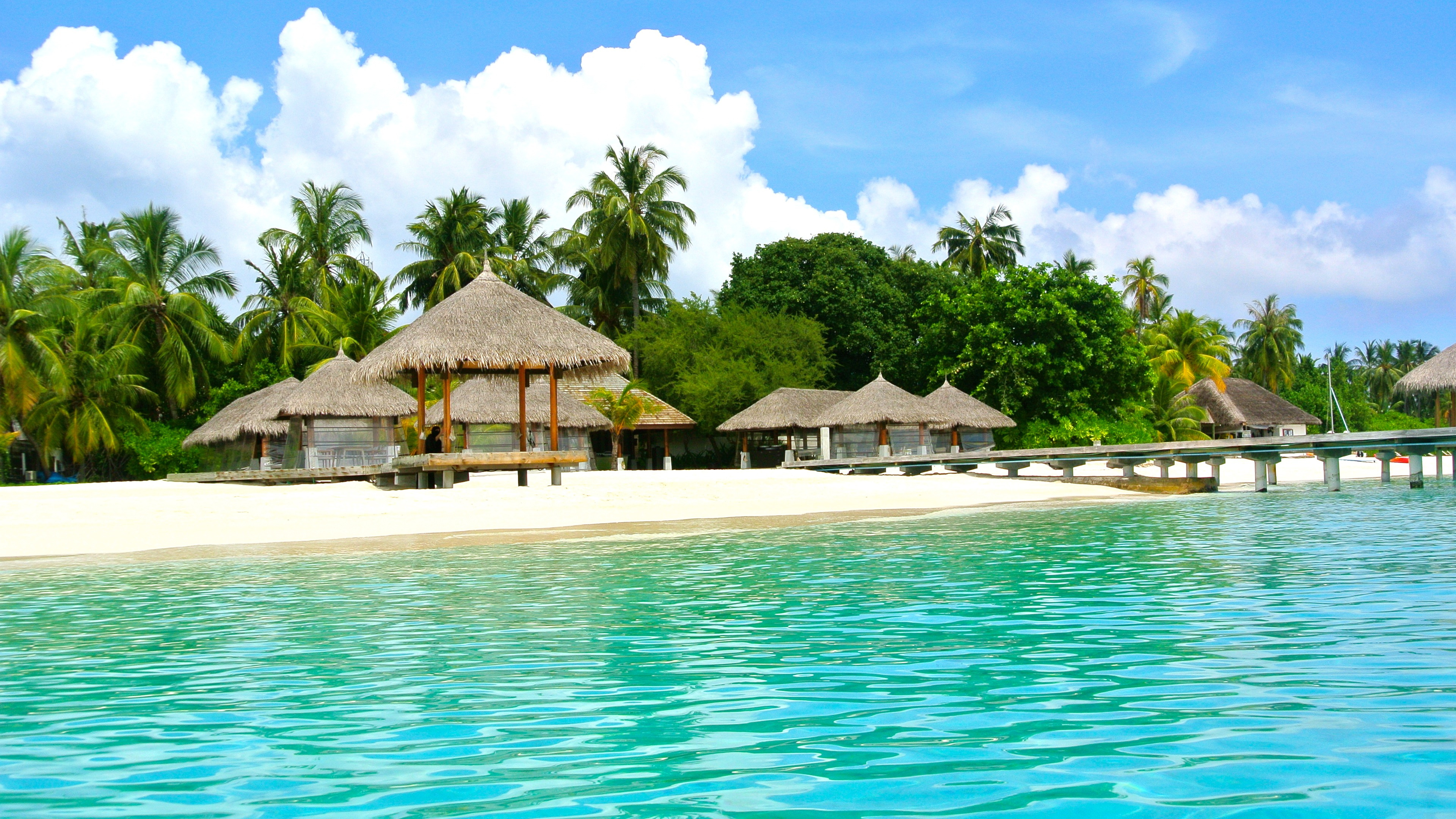 Brown Wooden House on The Beach During Daytime. Wallpaper in 3840x2160 Resolution