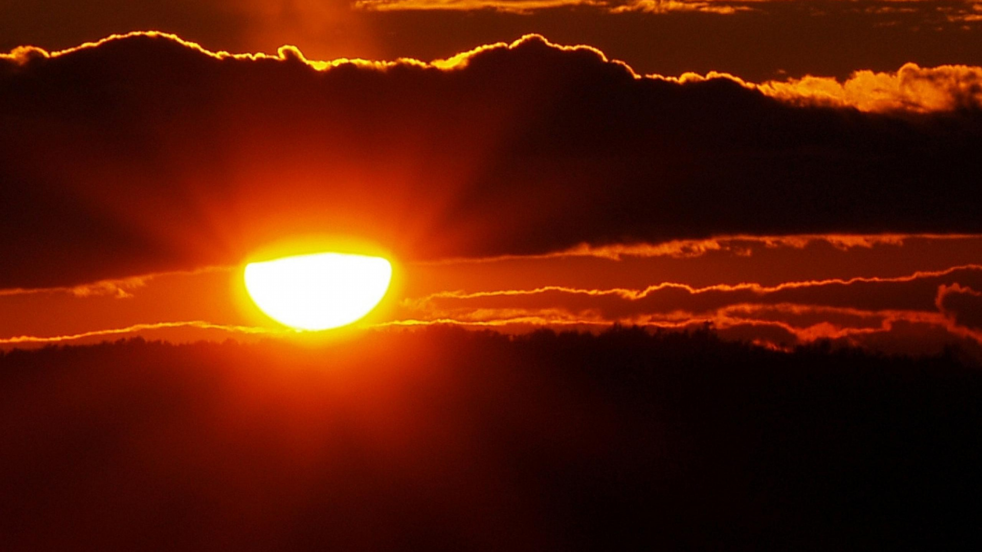 Sun Setting Over The Clouds. Wallpaper in 1920x1080 Resolution