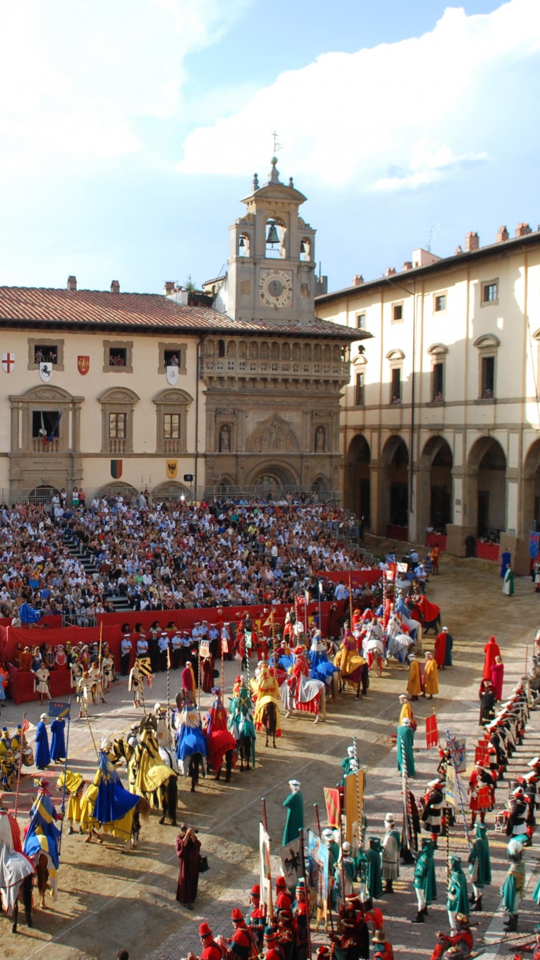 Leute, Die Tagsüber in Der Nähe Eines Braunen Betongebäudes Auf Der Straße Gehen. Wallpaper in 1080x1920 Resolution