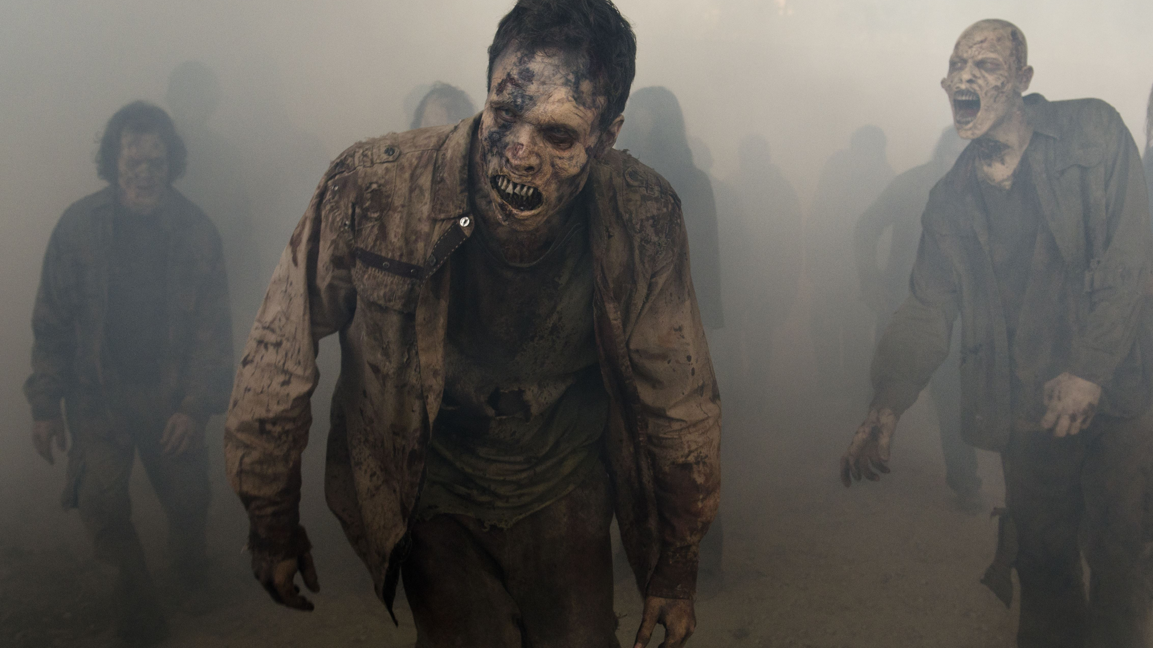 Man in Black and Brown Camouflage Suit. Wallpaper in 3840x2160 Resolution