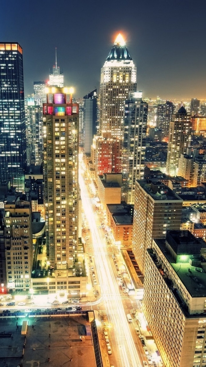 City Buildings During Night Time. Wallpaper in 720x1280 Resolution