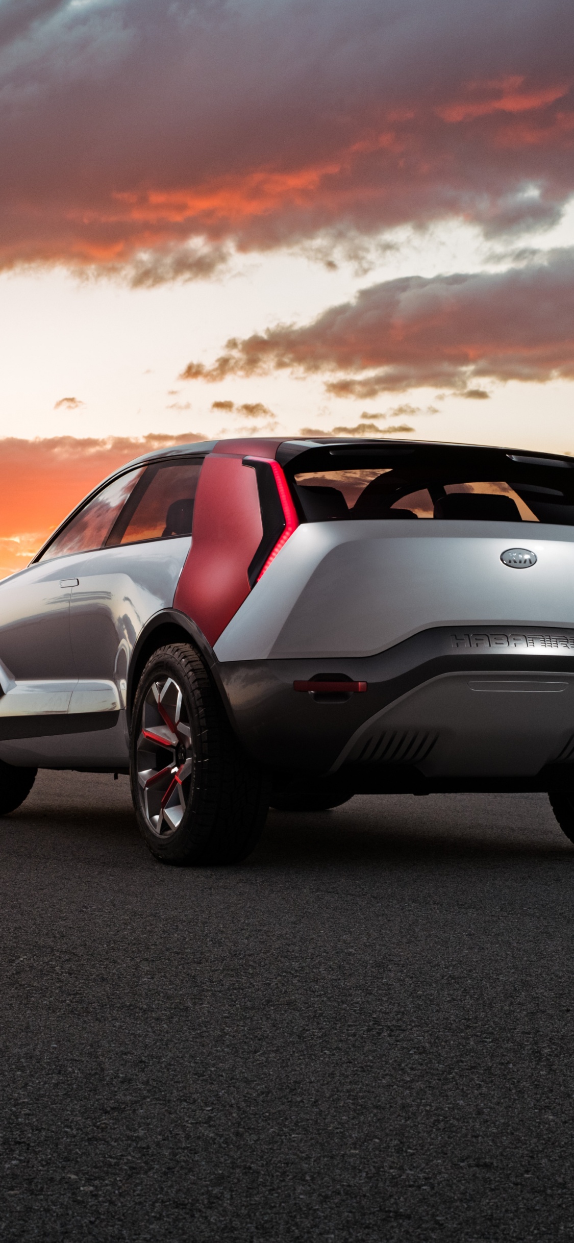 White Porsche 911 on Road During Sunset. Wallpaper in 1125x2436 Resolution