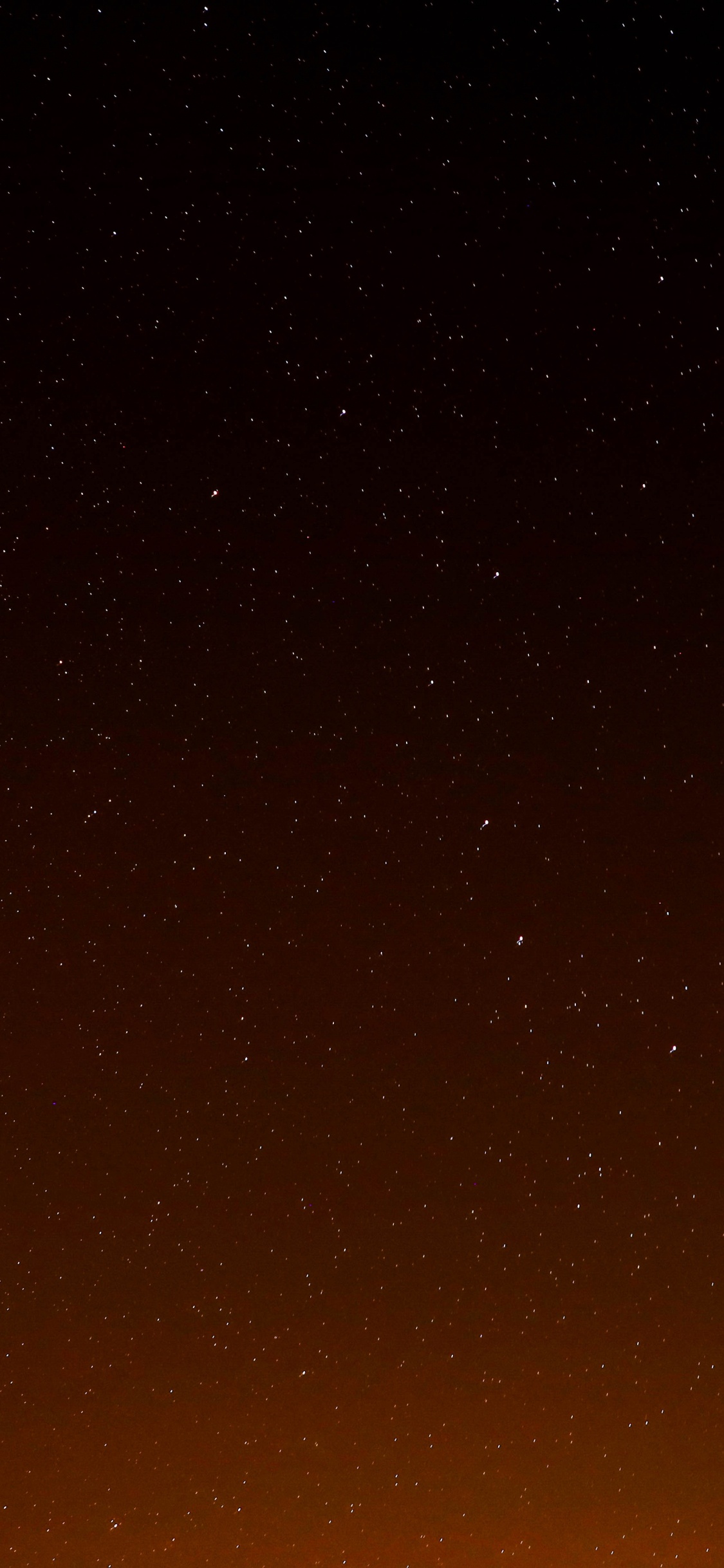 Black and Brown Sky During Night Time. Wallpaper in 1125x2436 Resolution