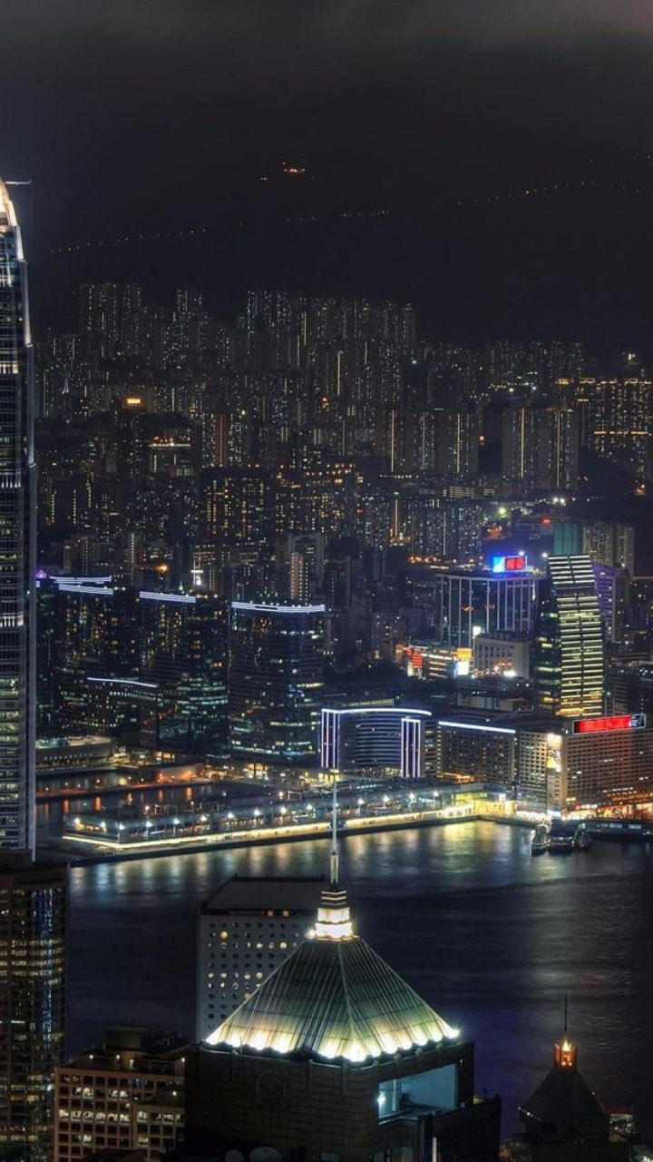 City Skyline During Night Time. Wallpaper in 720x1280 Resolution