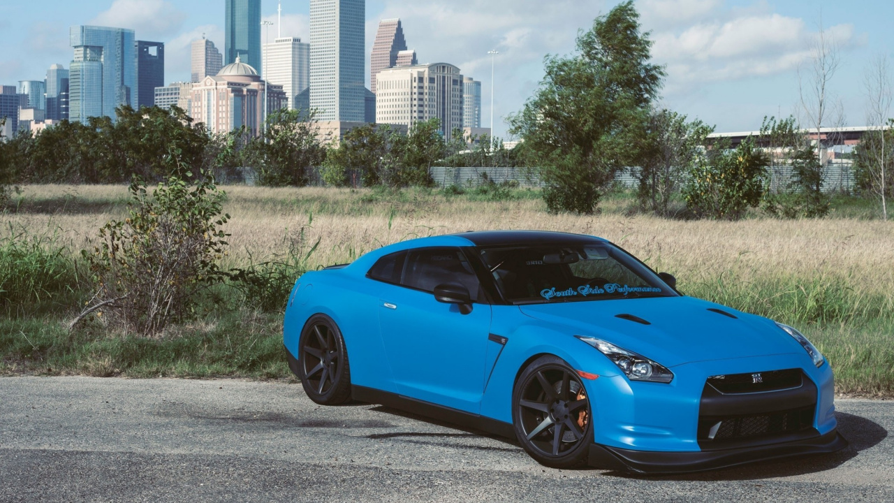 Porsche 911 Bleue Garée Sur Une Route en Béton Gris Pendant la Journée. Wallpaper in 1280x720 Resolution