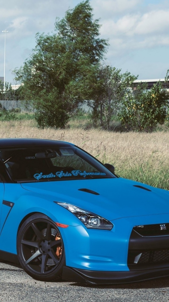 Porsche 911 Bleue Garée Sur Une Route en Béton Gris Pendant la Journée. Wallpaper in 720x1280 Resolution