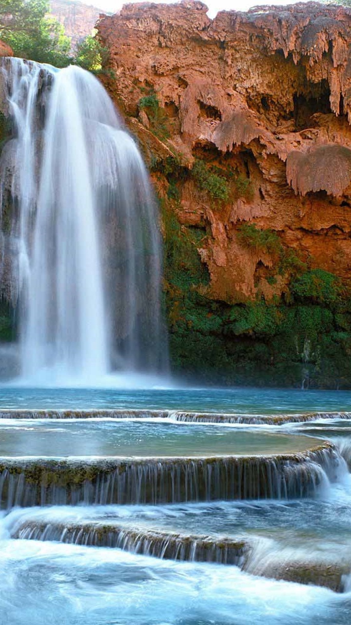 Waterfalls in Brown Rocky Mountain During Daytime. Wallpaper in 720x1280 Resolution