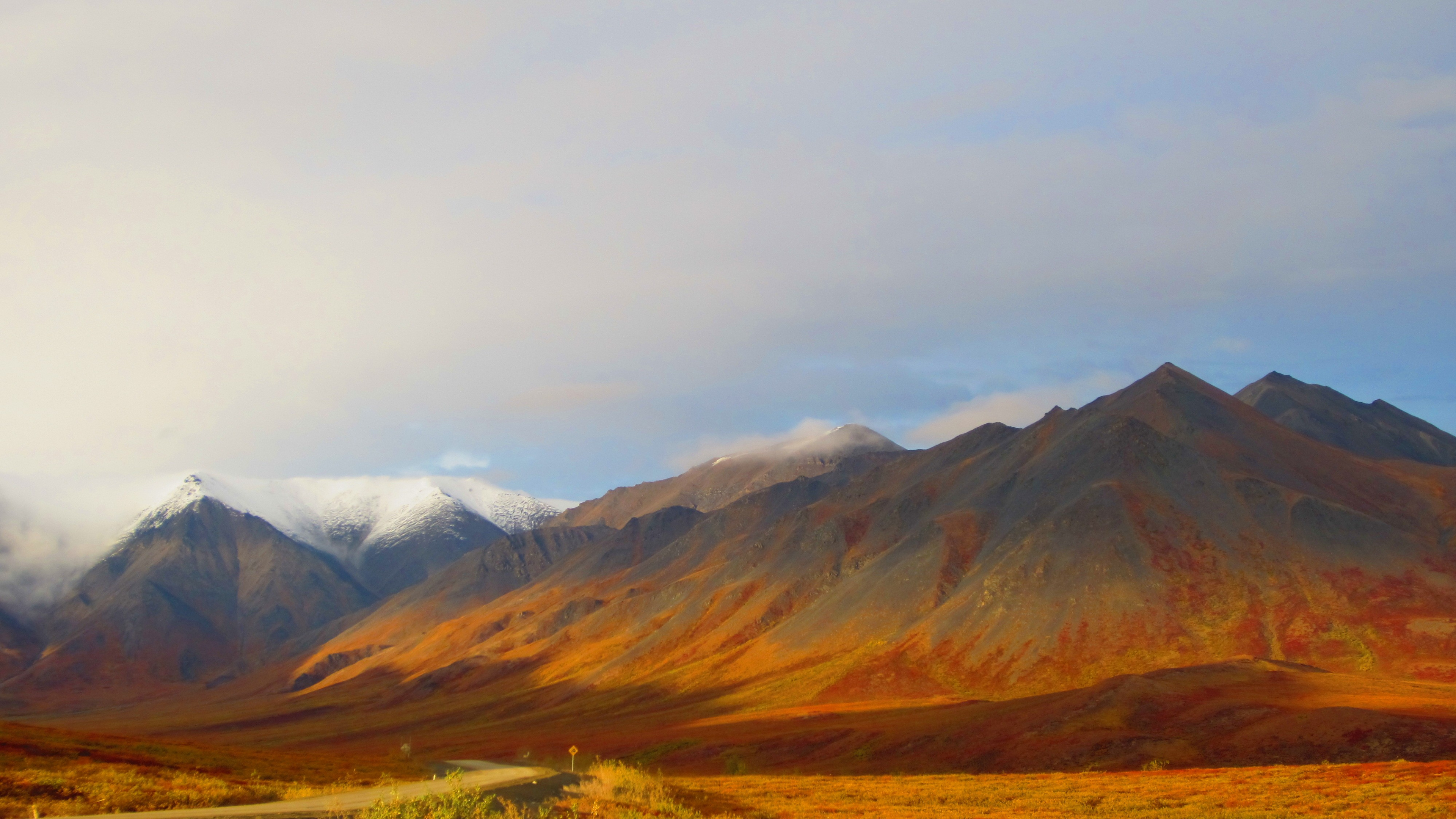 Brown and White Mountains Under White Clouds During Daytime. Wallpaper in 3840x2160 Resolution