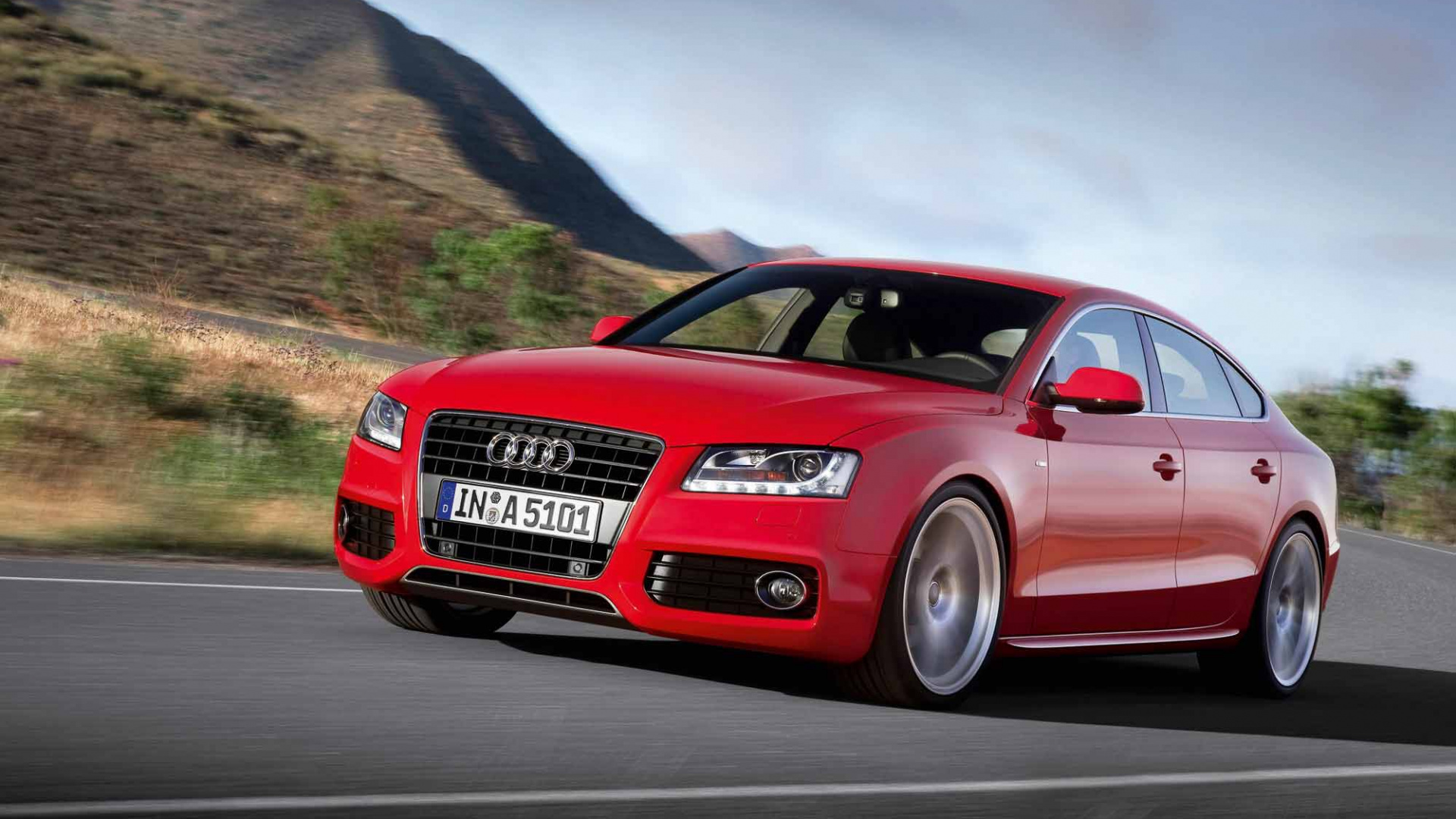 Coupé Audi Rouge Sur Route Pendant la Journée. Wallpaper in 1920x1080 Resolution