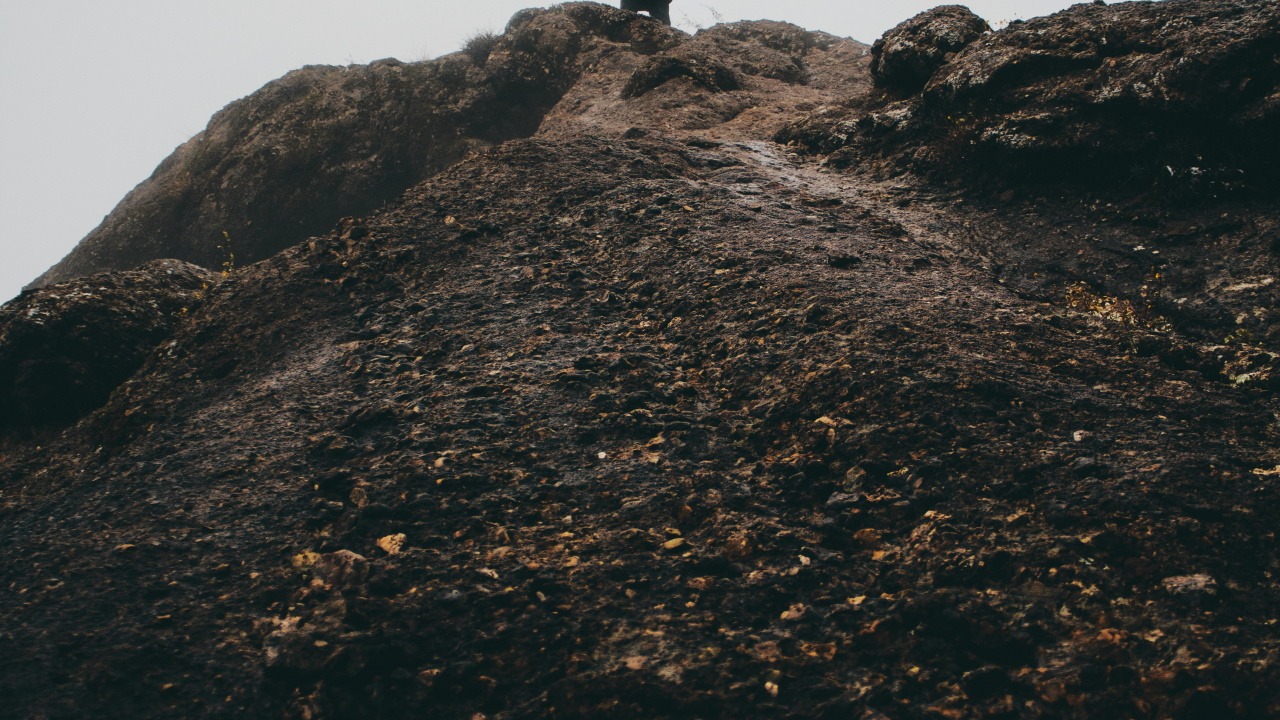 Silhouette of Man Standing on Rock Formation During Daytime. Wallpaper in 1280x720 Resolution