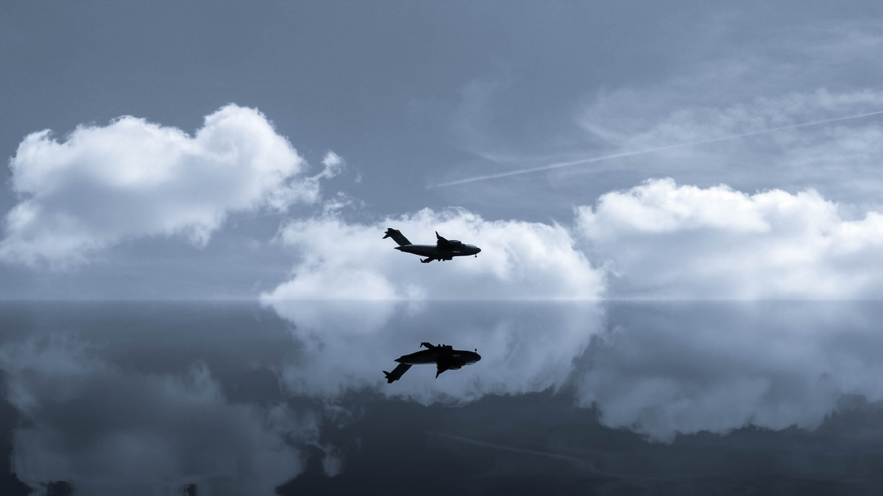 Avion Noir Volant Dans le Ciel Pendant la Journée. Wallpaper in 1280x720 Resolution