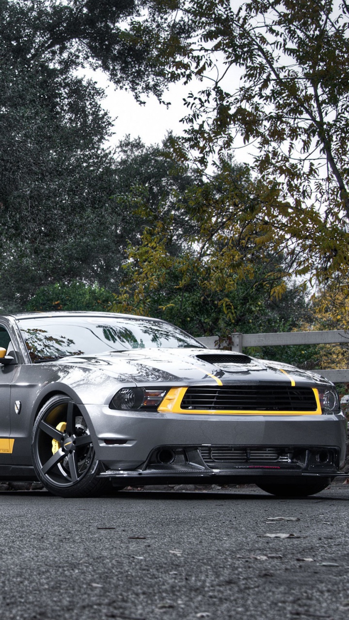 Black and Yellow Porsche 911 on Road During Daytime. Wallpaper in 720x1280 Resolution