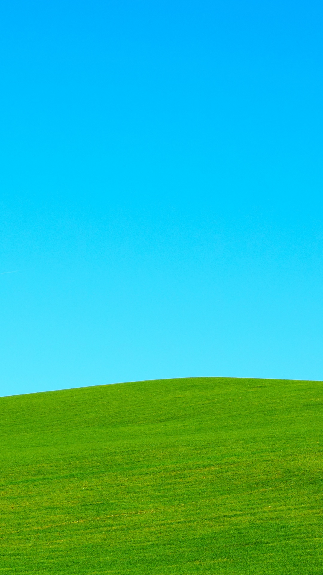 Green Grass Field Under Blue Sky During Daytime. Wallpaper in 1080x1920 Resolution