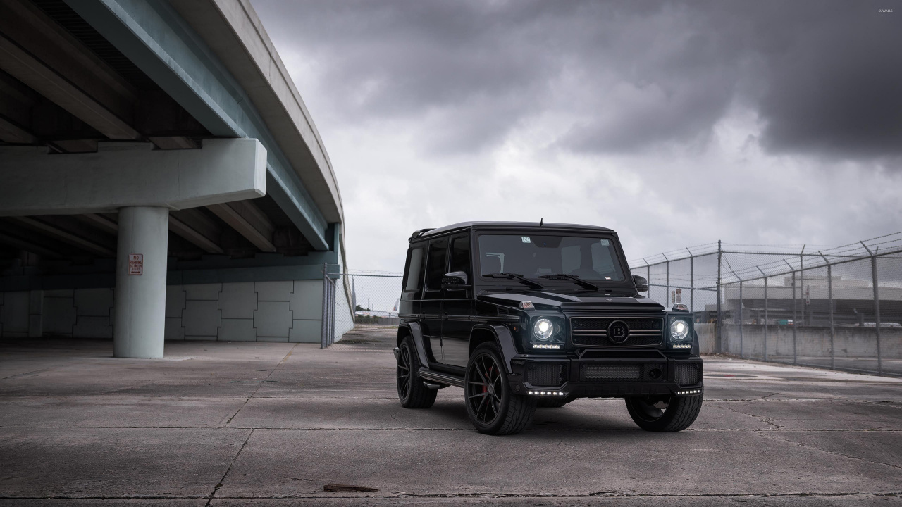 Black Jeep Wrangler Parked Beside Blue and White House Under White Clouds and Blue Sky During. Wallpaper in 1280x720 Resolution