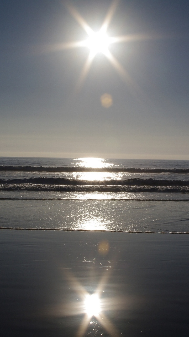 Soleil Couchant Sur la Mer. Wallpaper in 720x1280 Resolution