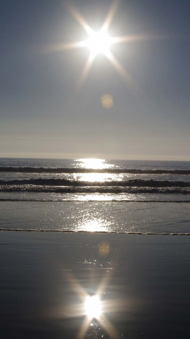 Sonnenuntergang Über Dem Meer. Wallpaper in 750x1334 Resolution