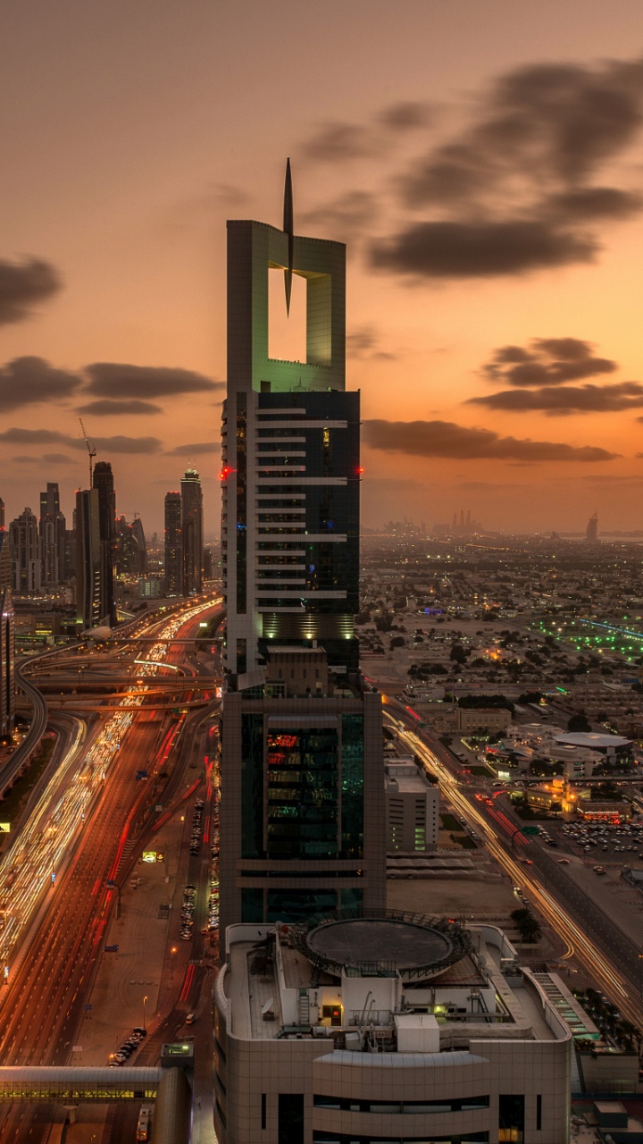 City Skyline During Night Time. Wallpaper in 720x1280 Resolution