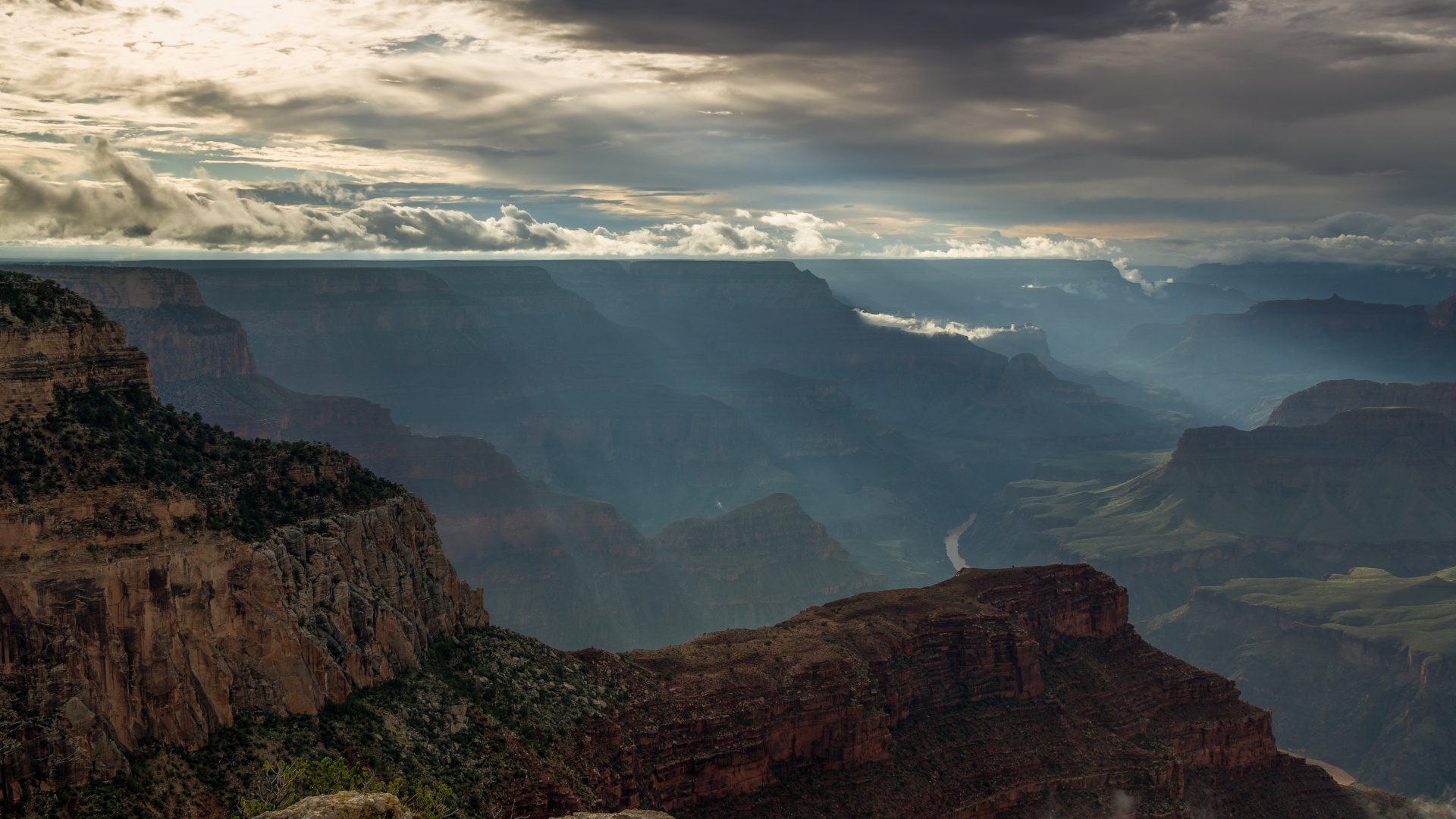 Brown Rocky Mountain Under White Clouds During Daytime. Wallpaper in 1920x1080 Resolution