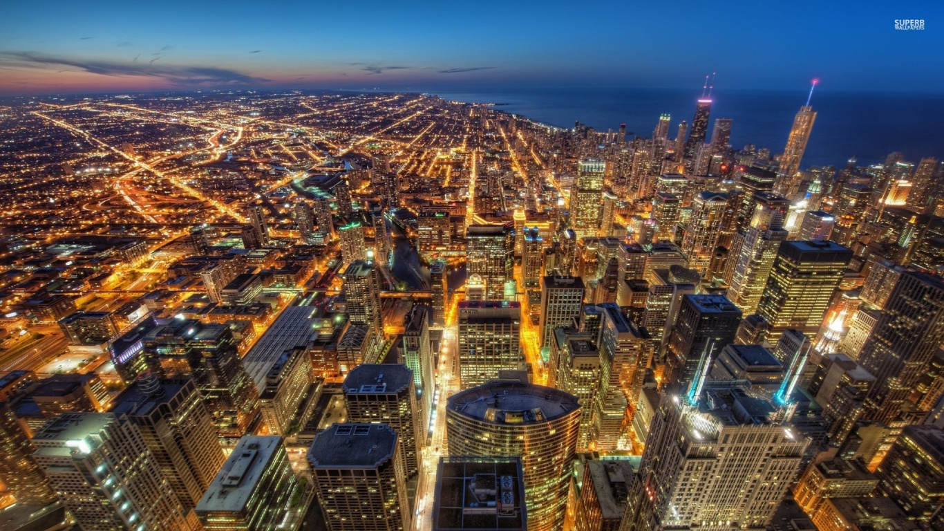 Aerial View of City Buildings During Night Time. Wallpaper in 1366x768 Resolution