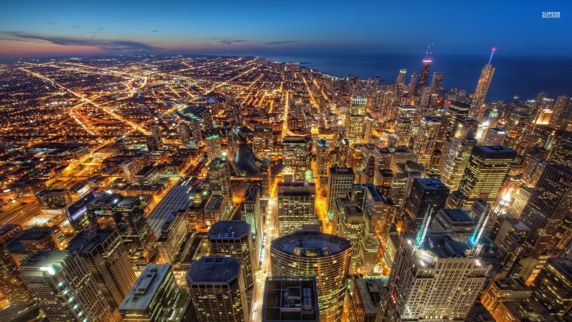 Aerial View of City Buildings During Night Time. Wallpaper in 1920x1080 Resolution