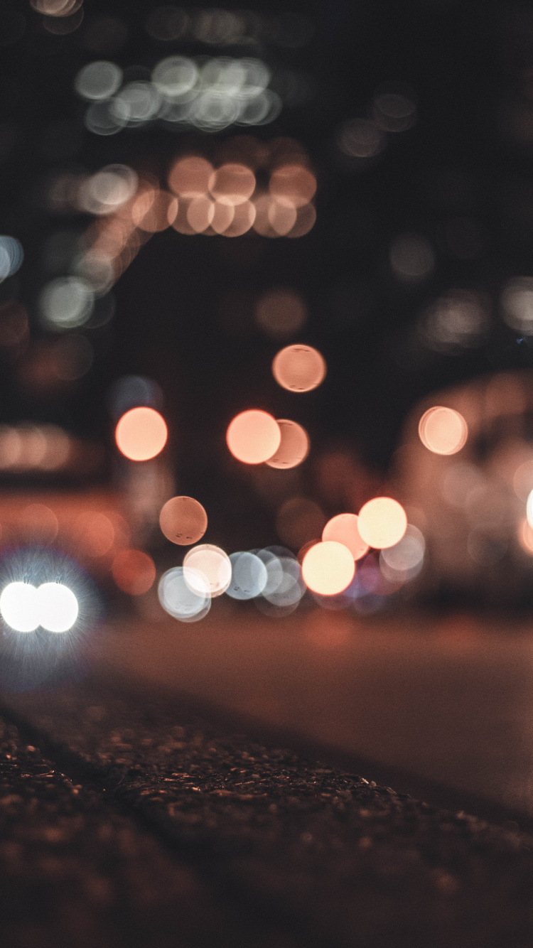 Fotografía Bokeh de Las Luces de la Ciudad Durante la Noche.. Wallpaper in 750x1334 Resolution