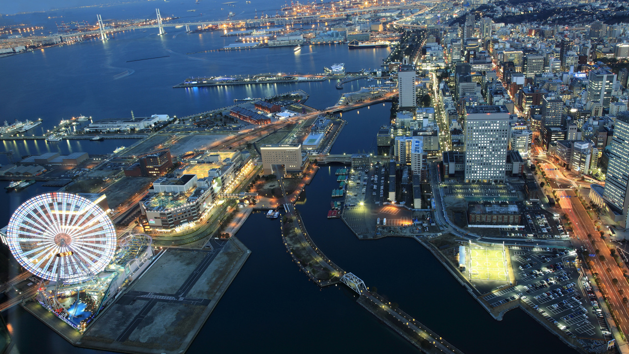 Vista Aérea de Los Edificios de la Ciudad Durante la Noche.. Wallpaper in 1280x720 Resolution