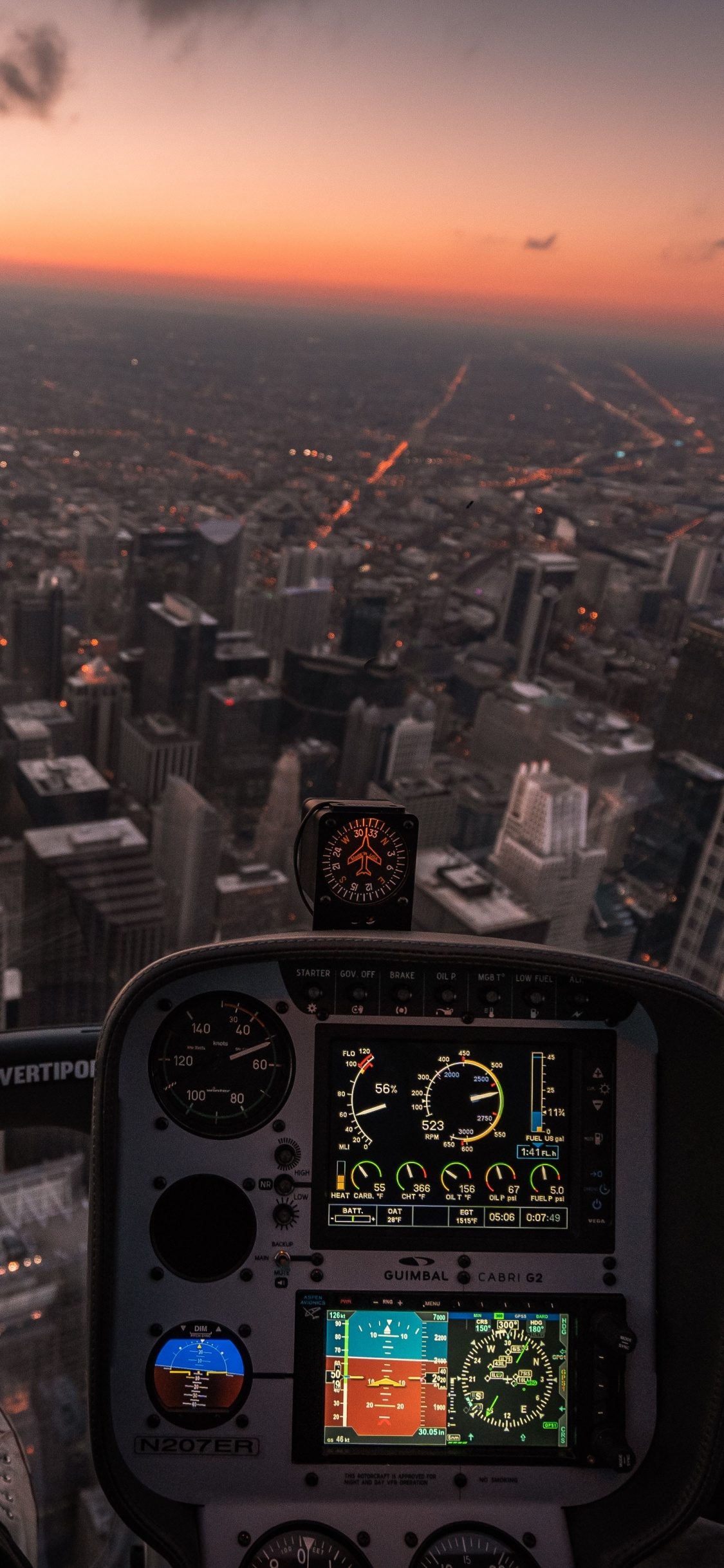 Vista Aérea de Los Edificios de la Ciudad Durante el Día.. Wallpaper in 1125x2436 Resolution