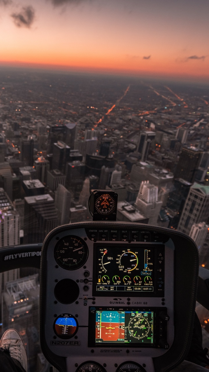 Luftaufnahme Von Stadtgebäuden Tagsüber. Wallpaper in 720x1280 Resolution