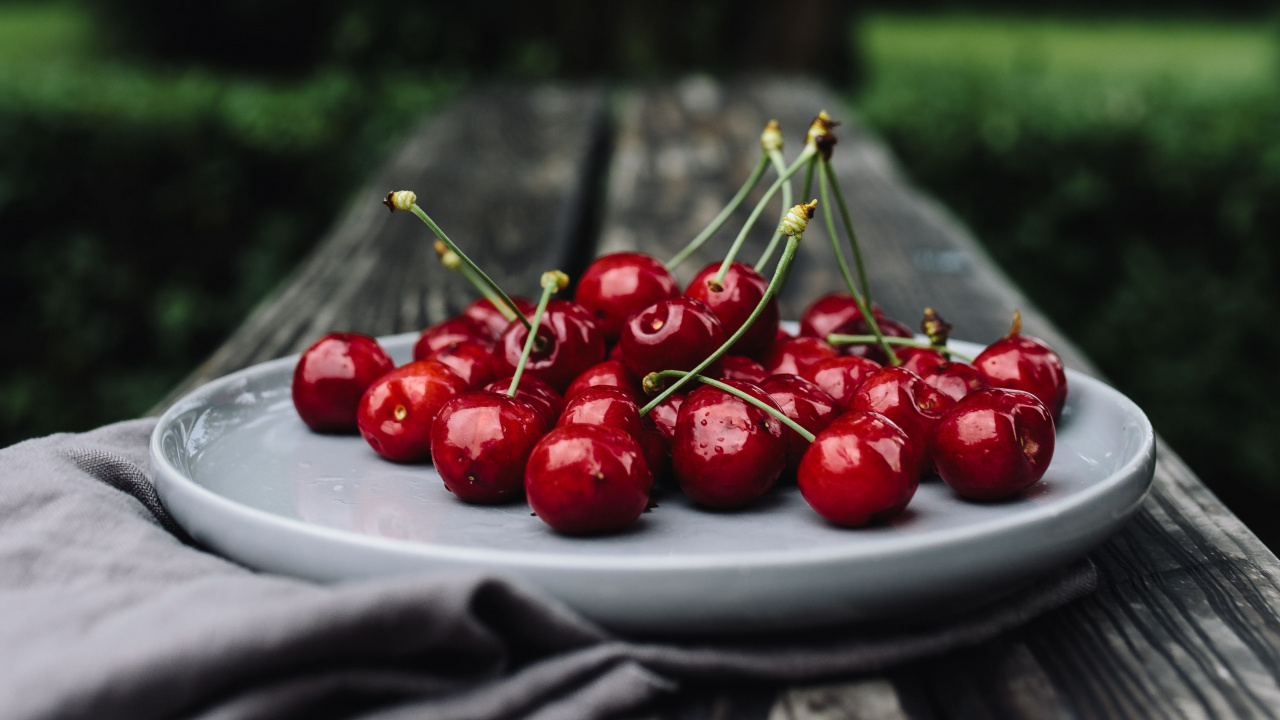 Red Cherries on White Ceramic Plate. Wallpaper in 1280x720 Resolution