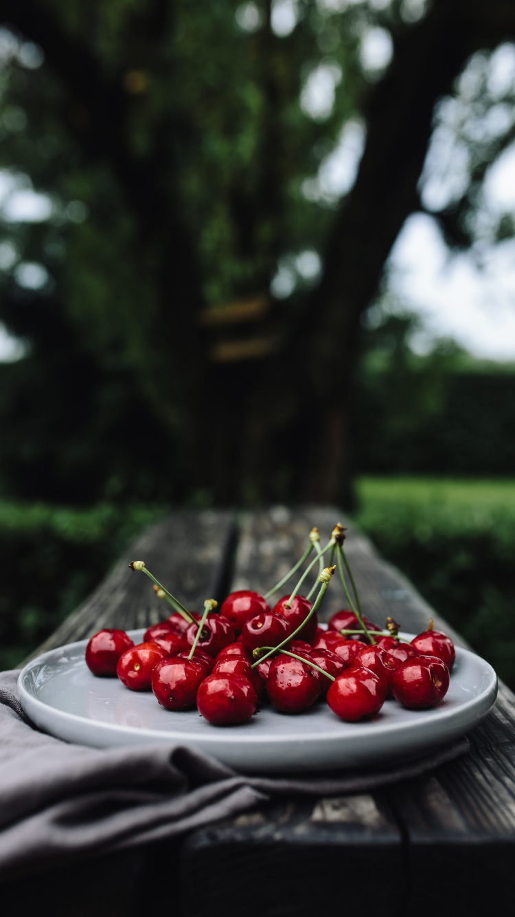 Red Cherries on White Ceramic Plate. Wallpaper in 750x1334 Resolution
