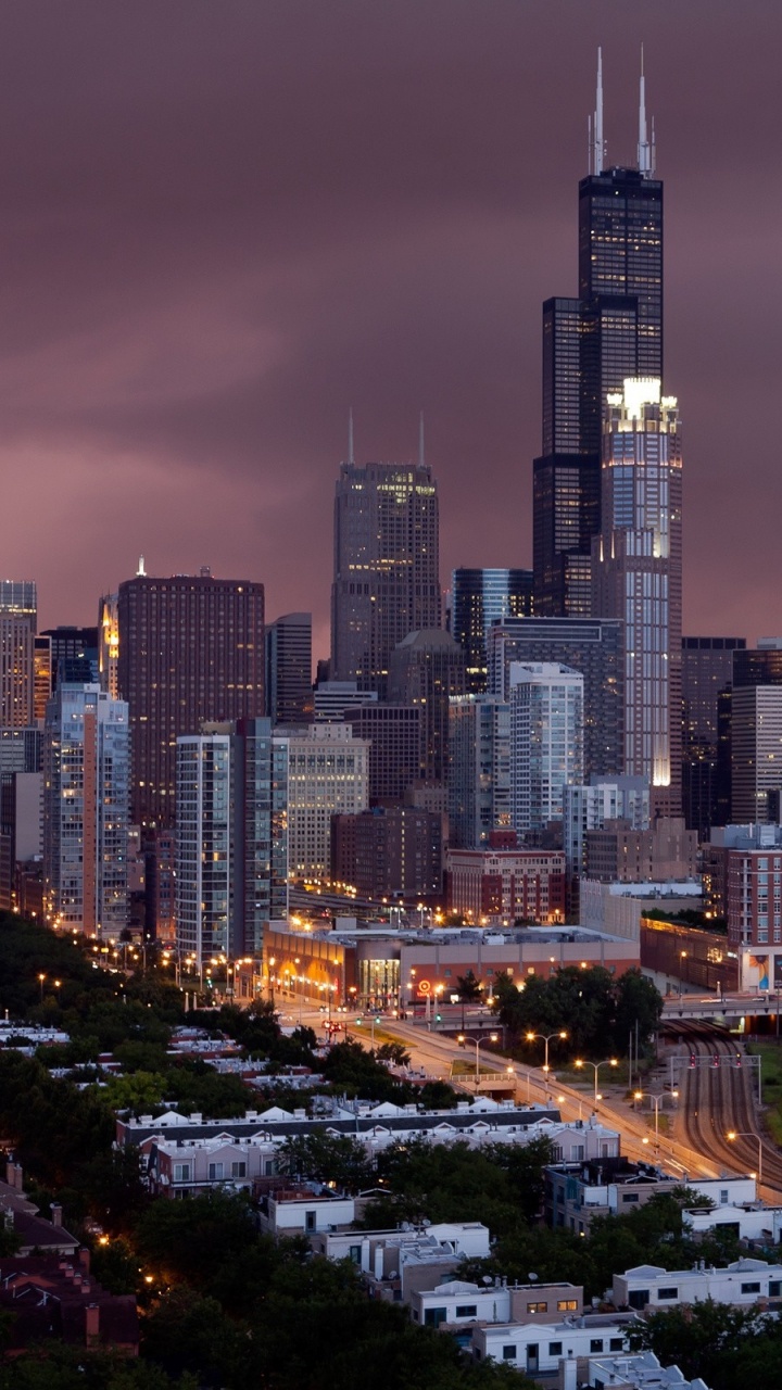 City Buildings Under Gray Sky During Daytime. Wallpaper in 720x1280 Resolution