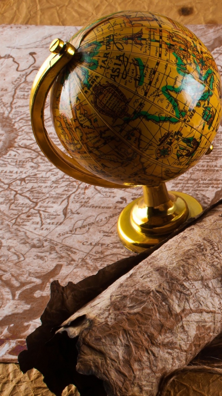 Blue and Brown Desk Globe. Wallpaper in 720x1280 Resolution