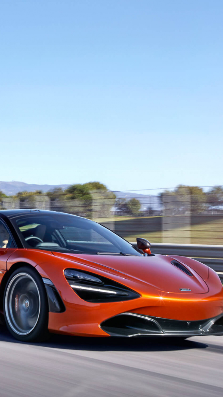 Red Ferrari 458 Italia on Road During Daytime. Wallpaper in 750x1334 Resolution