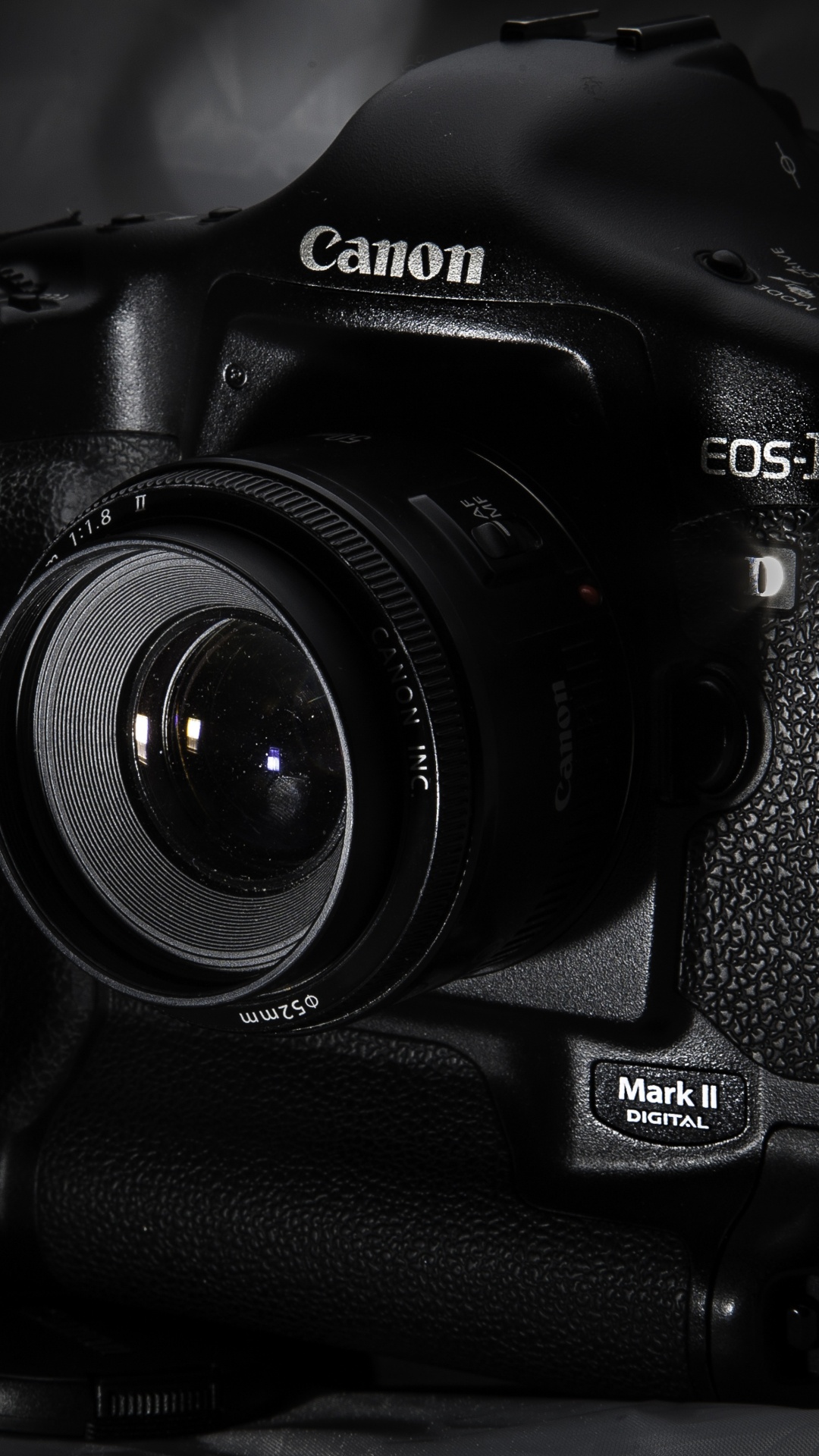 Black Nikon Dslr Camera on White Textile. Wallpaper in 1080x1920 Resolution