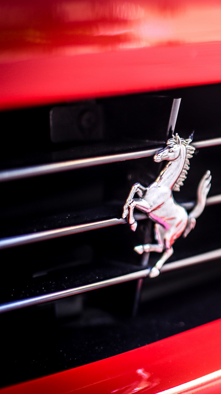 Red and White Car in Close up Photography. Wallpaper in 750x1334 Resolution