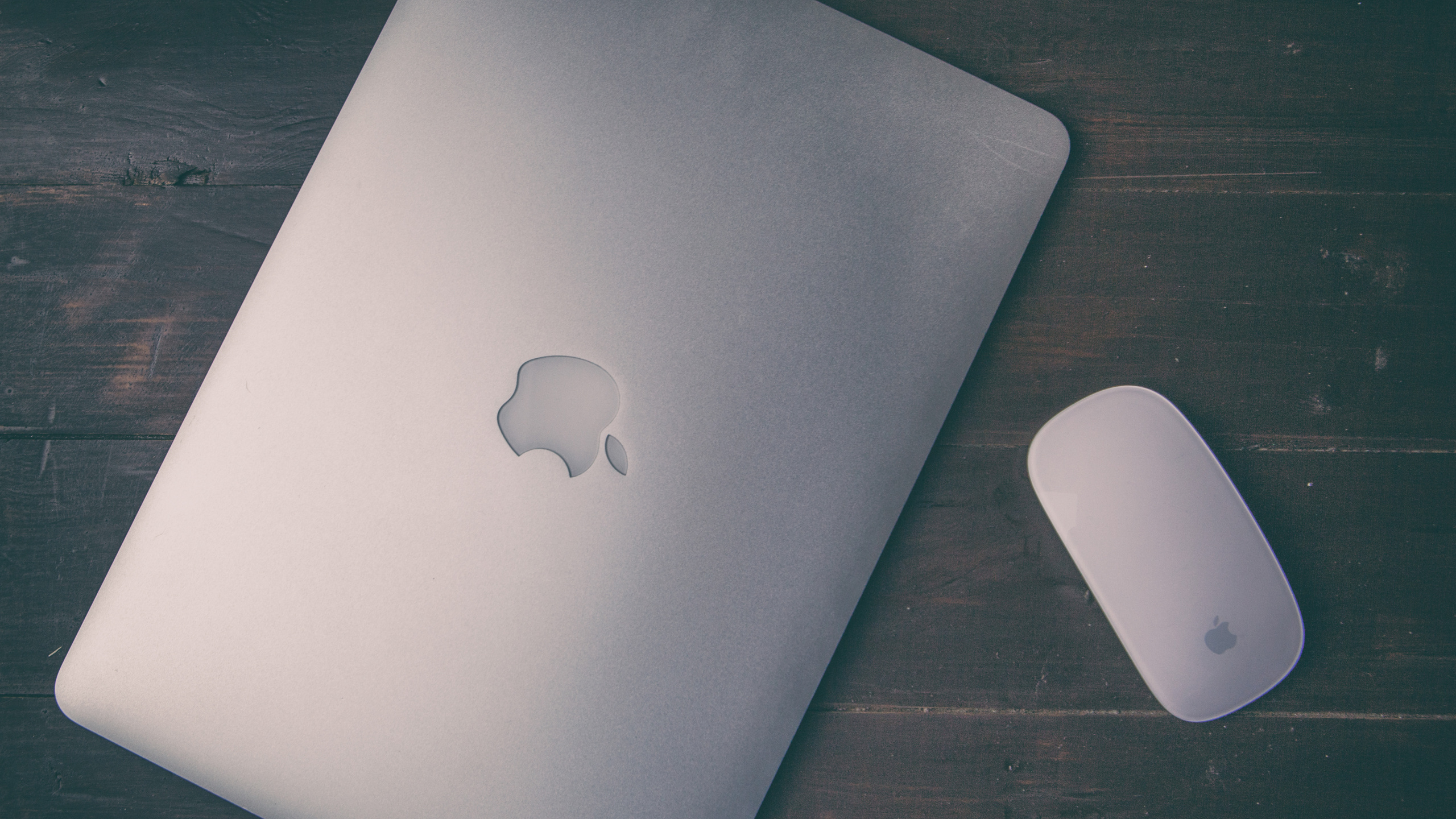 Silver Macbook on Brown Wooden Table. Wallpaper in 2560x1440 Resolution