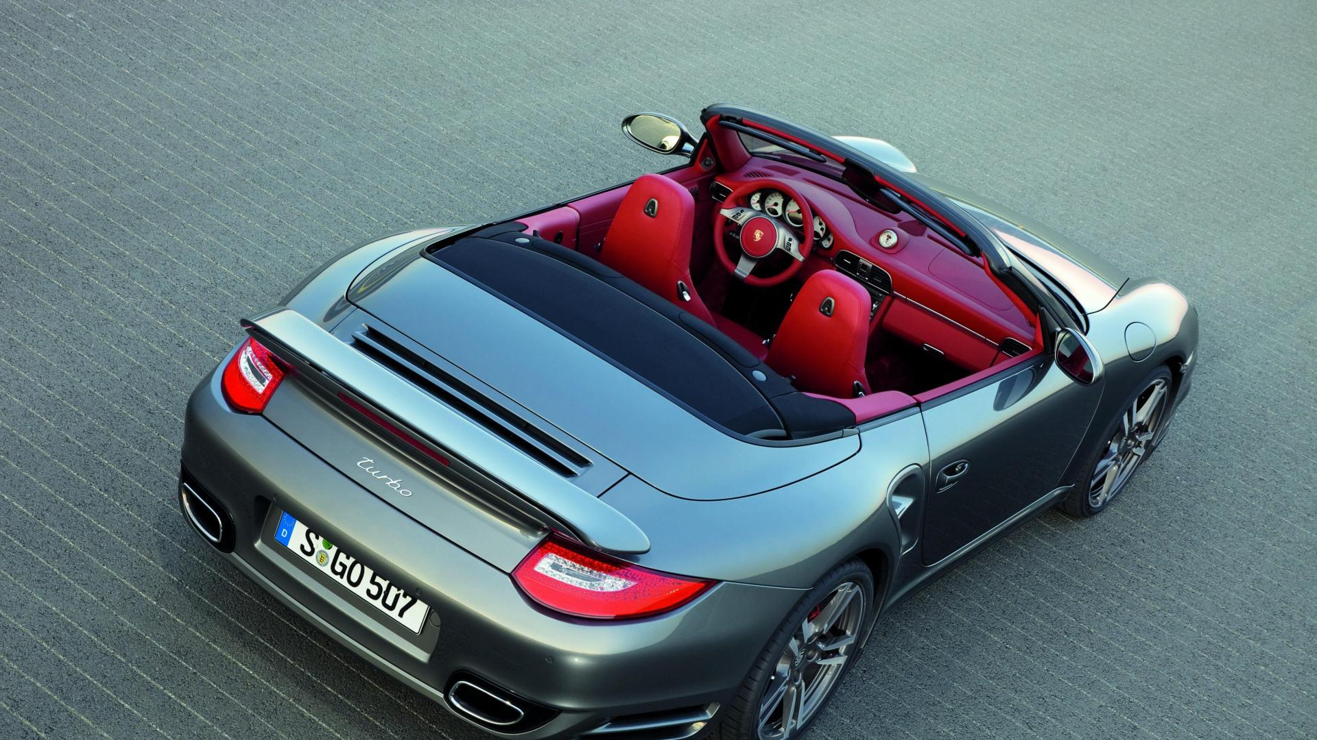 Schwarz-roter Porsche 911 Unterwegs. Wallpaper in 1920x1080 Resolution