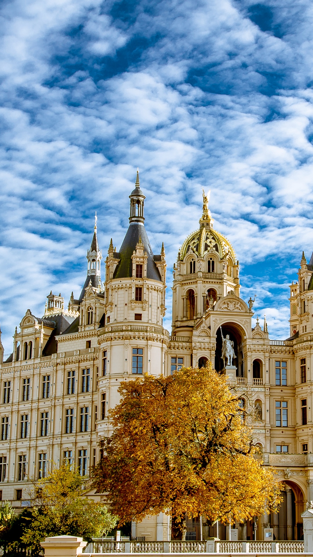 Brown and Gray Concrete Building Under Blue Sky and White Clouds During Daytime. Wallpaper in 1080x1920 Resolution
